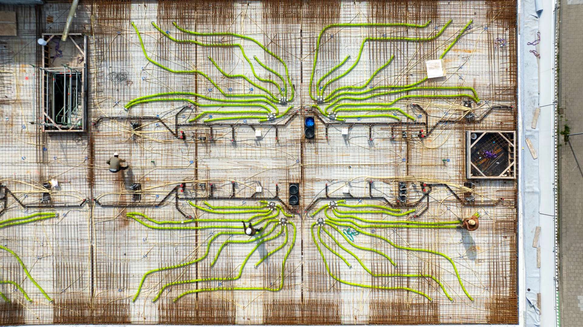 thermal imaging of building facade showing heat patterns and insulation issues, infrared drone inspection, professional construction analysis, technical building survey