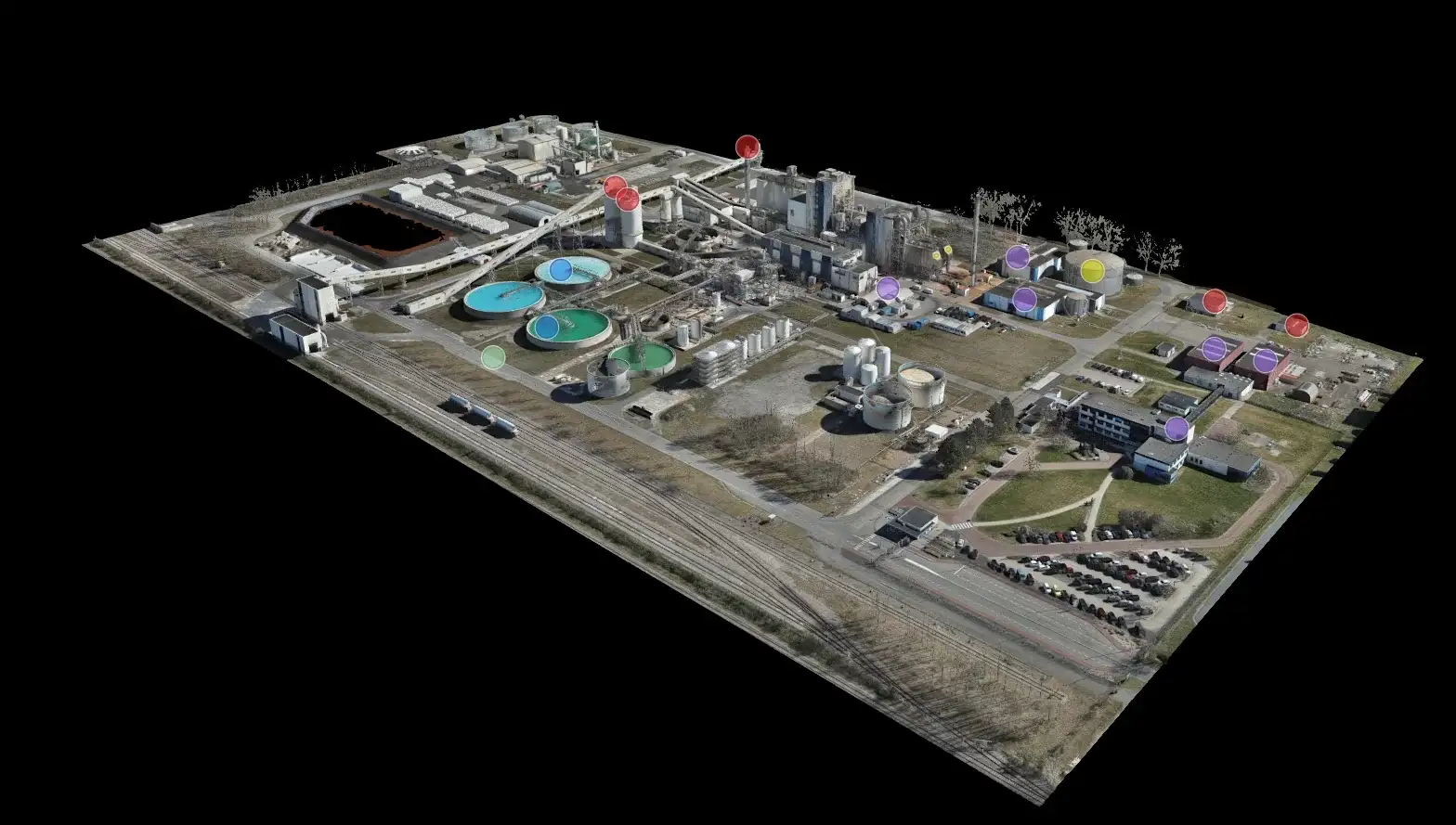3D-model van een industrieterrein met bassins en tanks